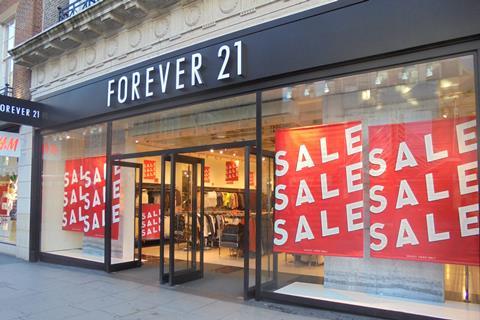 Forever 21 has employed a back-to-basics approach that focuses on red Sales banners